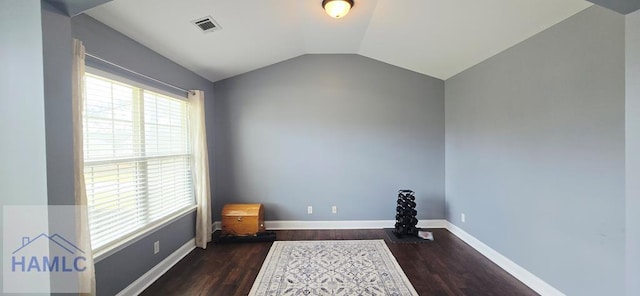 14 Cantebury Rd, Ludowici, GA 31316 - spare room with wood finished floors and vaulted ceiling