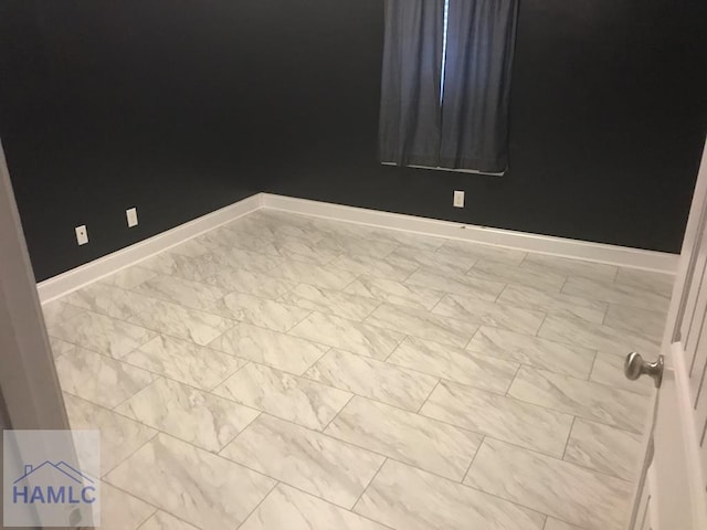 14 Cantebury Rd, Ludowici, GA 31316 - unfurnished room with baseboards and marble look tiles