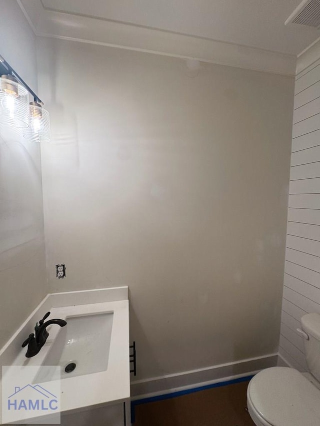 43 Belle Island Way, Richmond Hill, GA 31324 - half bathroom featuring toilet and vanity