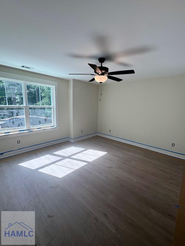 43 Belle Island Way, Richmond Hill, GA 31324 - unfurnished room with wood finished floors and ceiling fan