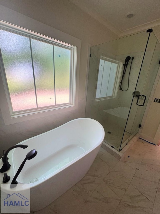 43 Belle Island Way, Richmond Hill, GA 31324 - full bathroom with a soaking tub, a stall shower, and marble finish floors