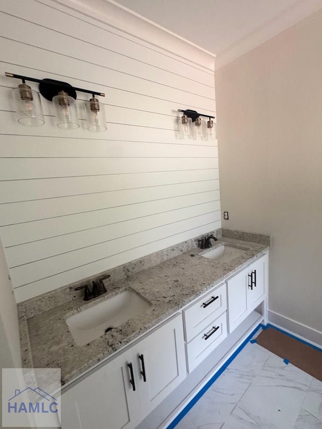 43 Belle Island Way, Richmond Hill, GA 31324 - bathroom with double vanity, wooden walls, marble finish floors, and ornamental molding