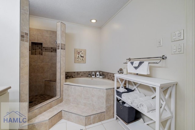 bathroom featuring tile patterned floors, shower with separate bathtub, crown molding, and a textured ceiling