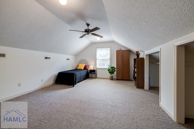 unfurnished bedroom with light carpet, ceiling fan, and lofted ceiling