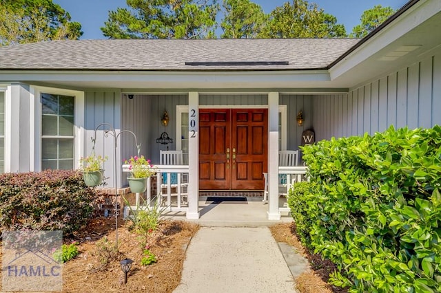 entrance to property with a porch