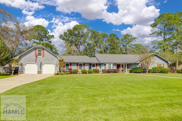 ranch-style home featuring a front yard and a garage