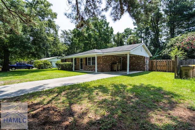 exterior space with a carport and a front lawn