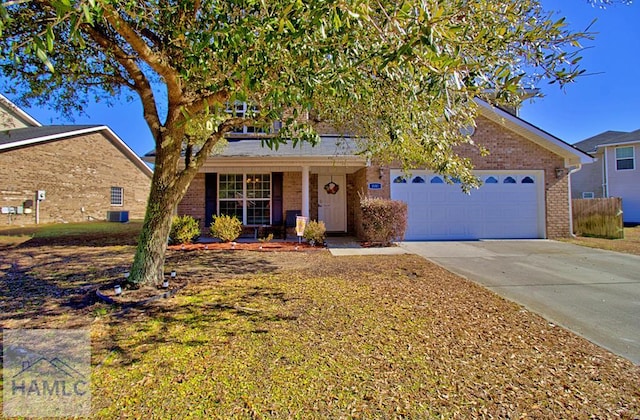 view of front of house with a porch and a garage