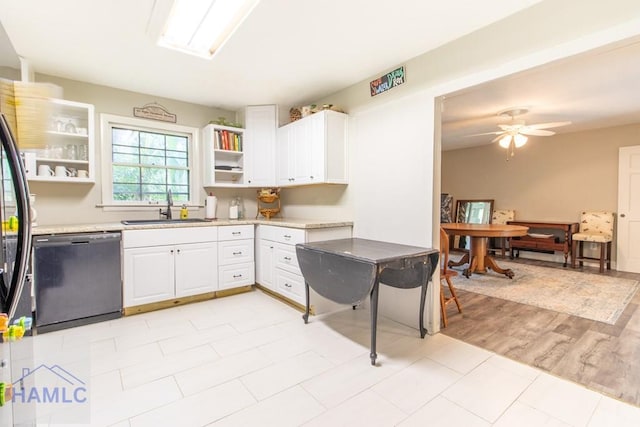 375 Eastridge Rd, Savannah, GA 31406 - kitchen featuring black dishwasher, white cabinetry, ceiling fan, and sink
