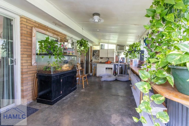375 Eastridge Rd, Savannah, GA 31406 - view of patio / terrace featuring a wall unit AC and ceiling fan