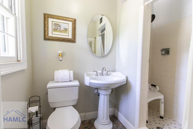 375 Eastridge Rd, Savannah, GA 31406 - bathroom with tile patterned flooring, toilet, and curtained shower