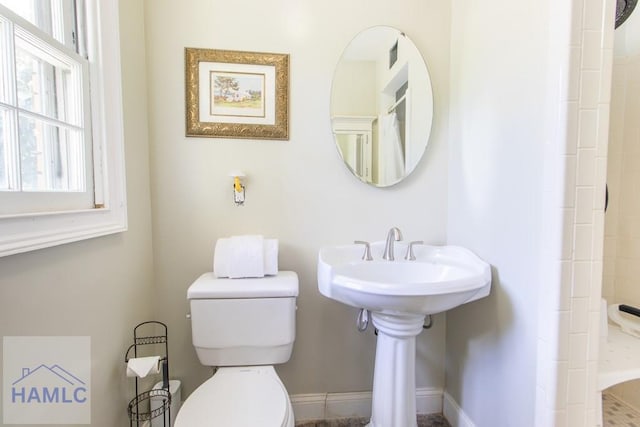 375 Eastridge Rd, Savannah, GA 31406 - bathroom with toilet and a shower with shower curtain