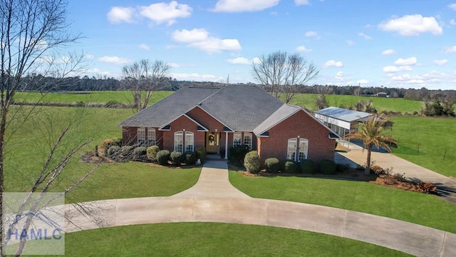 ranch-style home featuring a front yard