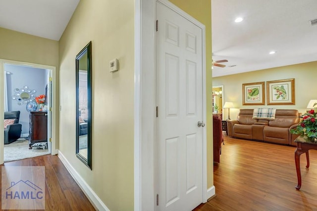 corridor featuring hardwood / wood-style flooring