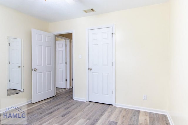 unfurnished bedroom featuring light hardwood / wood-style floors