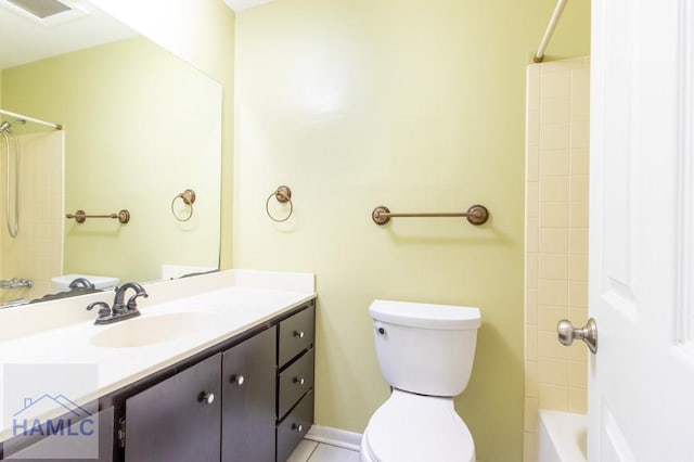 full bathroom featuring tile patterned flooring, vanity, tub / shower combination, and toilet