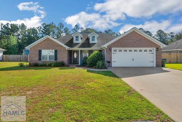 365 Carson St NE, Ludowici, GA 31316 - view of front of property with brick siding, a garage, and driveway