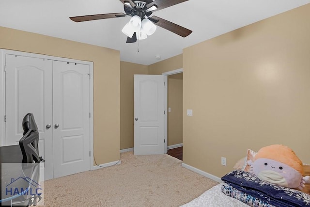 365 Carson St NE, Ludowici, GA 31316 - carpeted bedroom featuring baseboards, a closet, and ceiling fan