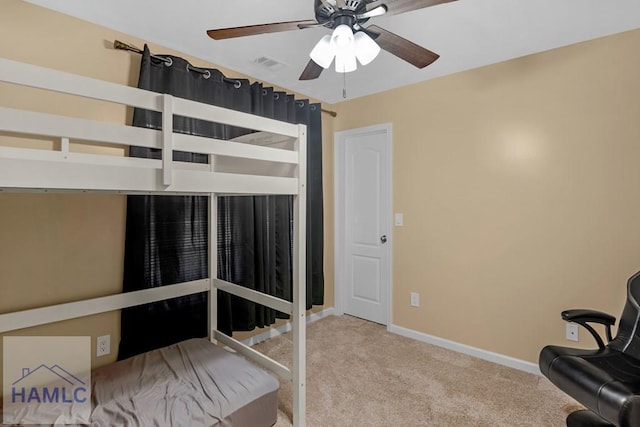 365 Carson St NE, Ludowici, GA 31316 - unfurnished bedroom with carpet flooring, baseboards, and a ceiling fan