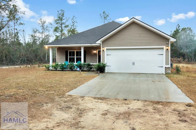 single story home with a garage and a porch