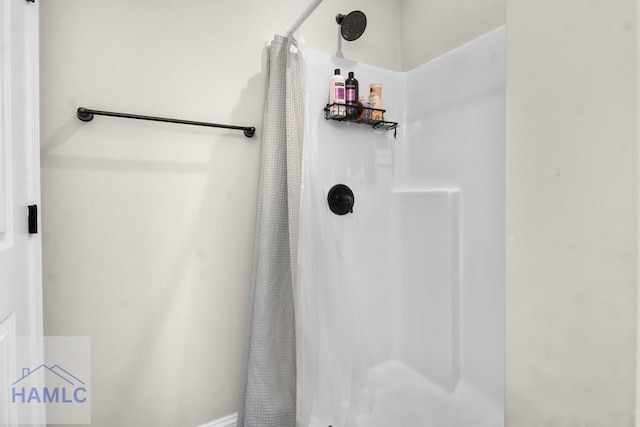 bathroom with curtained shower