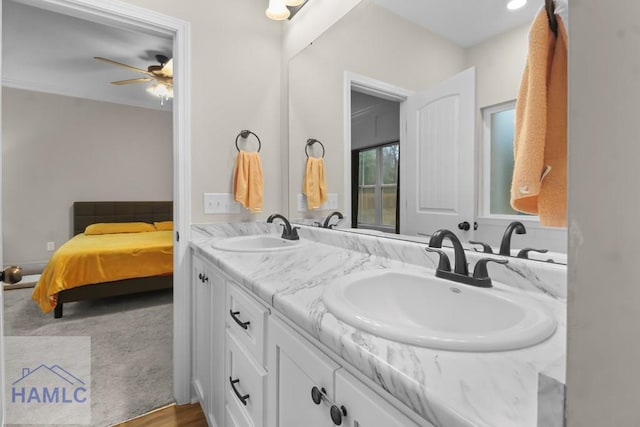 bathroom with vanity and ceiling fan