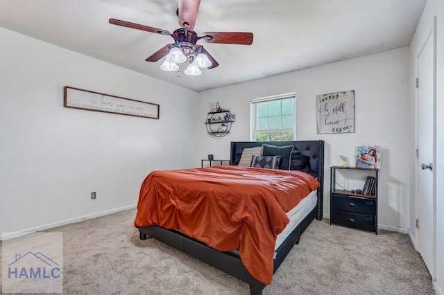 bedroom featuring carpet flooring, baseboards, and ceiling fan