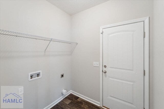 7 Summerhill Dr, Ludowici, GA 31316 - washroom featuring washer hookup, hookup for an electric dryer, laundry area, dark wood-style flooring, and baseboards