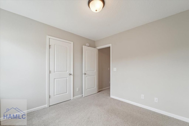 7 Summerhill Dr, Ludowici, GA 31316 - unfurnished bedroom featuring baseboards and carpet