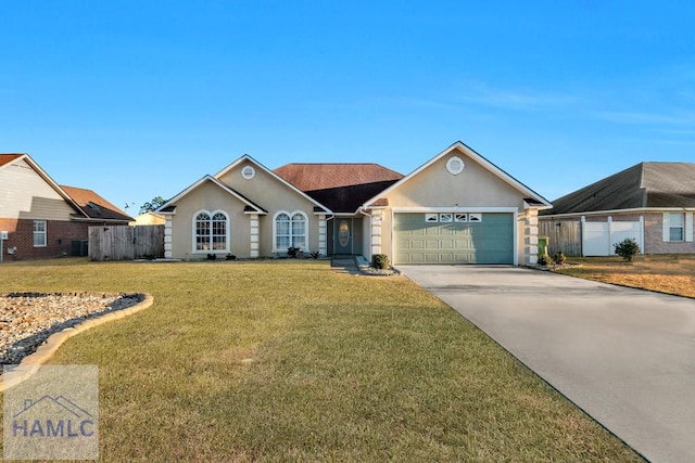 ranch-style house featuring a garage and a front yard