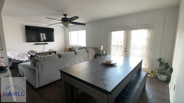 dining area with french doors and a ceiling fan