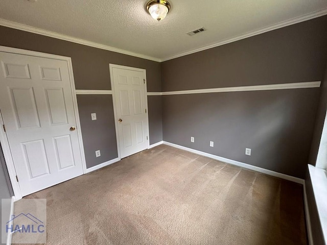 193 River Bend Dr, Midway, GA 31320 - unfurnished bedroom featuring carpet floors, a textured ceiling, and crown molding