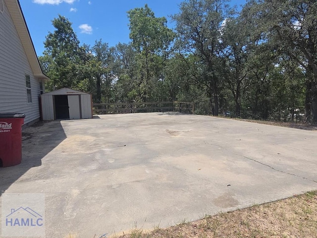 5927 Yellow Bluff Rd, Blackshear, GA 31516 - view of patio with a shed