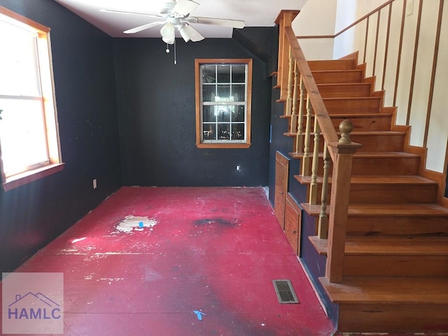 5927 Yellow Bluff Rd, Blackshear, GA 31516 - unfurnished living room featuring stairs and ceiling fan