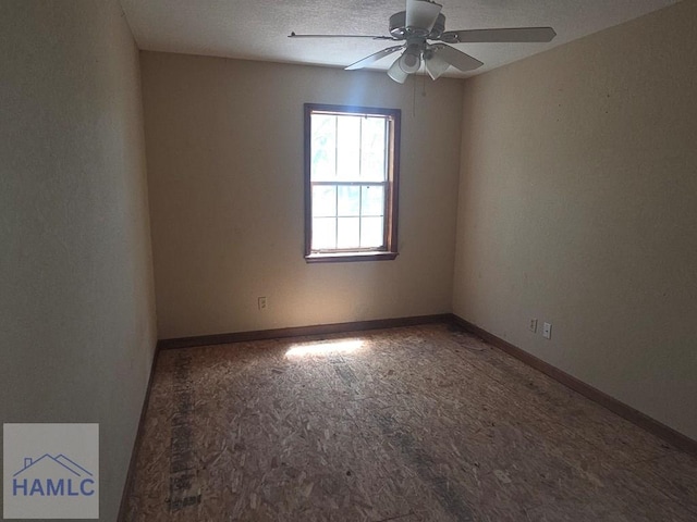 5927 Yellow Bluff Rd, Blackshear, GA 31516 - spare room featuring ceiling fan and baseboards