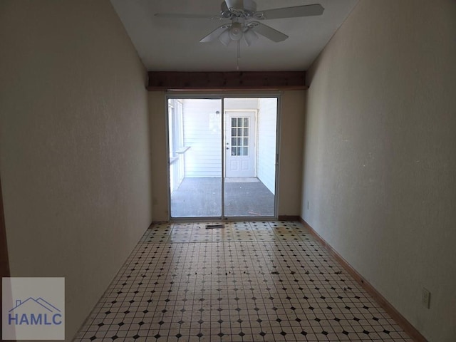 5927 Yellow Bluff Rd, Blackshear, GA 31516 - empty room with light floors and a ceiling fan