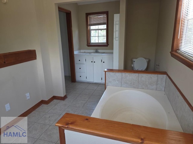5927 Yellow Bluff Rd, Blackshear, GA 31516 - bathroom with tile patterned floors, a bath, and vanity
