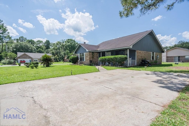 901 Pintail Ct, Hinesville, GA 31313 - single story home featuring a front lawn, brick siding, and concrete driveway