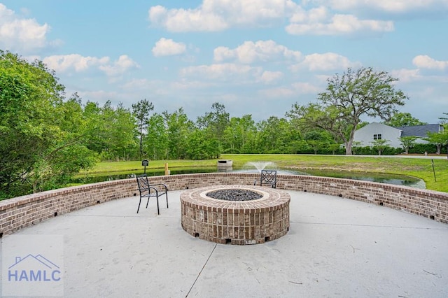view of patio / terrace featuring an outdoor fire pit and central air condition unit