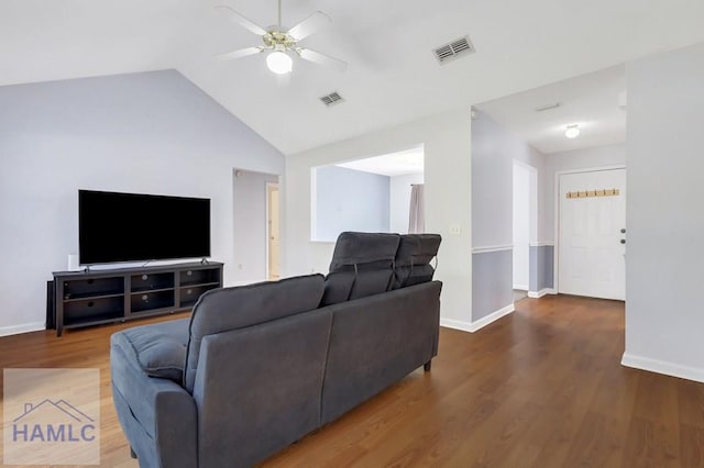 living room featuring lofted ceiling, wood-type flooring, and ceiling fan