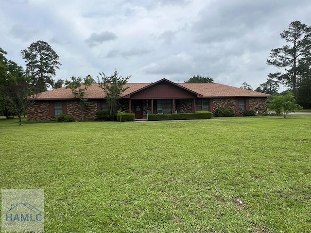 224 Bacon St, Jesup, GA 31545 - ranch-style home with a front yard