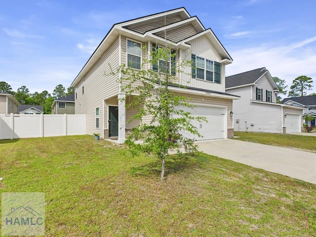 craftsman inspired home featuring concrete driveway, fence, a front yard, and a garage