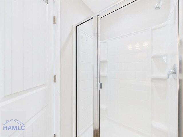 full bath featuring a stall shower