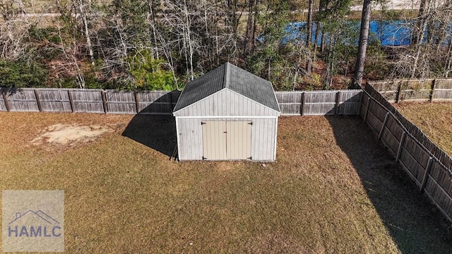 view of shed featuring a fenced backyard