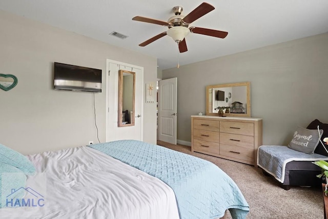 308 Mancey Garrason Loop NE, Ludowici, GA 31316 - bedroom featuring light carpet and ceiling fan
