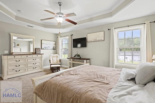 308 Mancey Garrason Loop NE, Ludowici, GA 31316 - bedroom featuring a raised ceiling, ornamental molding, baseboards, carpet floors, and ceiling fan