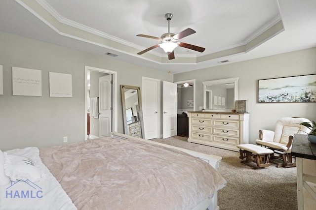 308 Mancey Garrason Loop NE, Ludowici, GA 31316 - bedroom featuring a tray ceiling, light colored carpet, ornamental molding, and ceiling fan