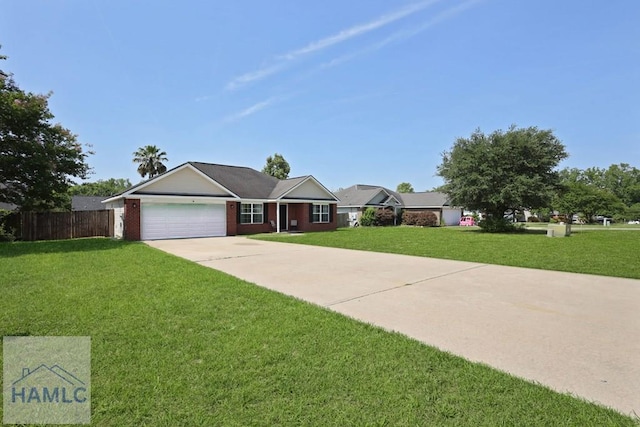 413 E Banks St, Glennville, GA 30427 - ranch-style house featuring an attached garage, driveway, and brick siding