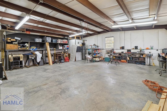 garage featuring a workshop area