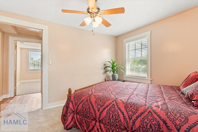 1514 Augusta Ave, Savannah, GA 31415 - carpeted bedroom with baseboards, attic access, and ceiling fan